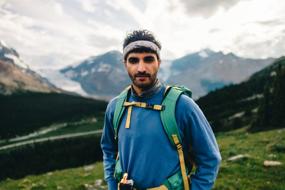Portrait of a hiker enjoying the scenic view in Jasper National Park, Alberta.